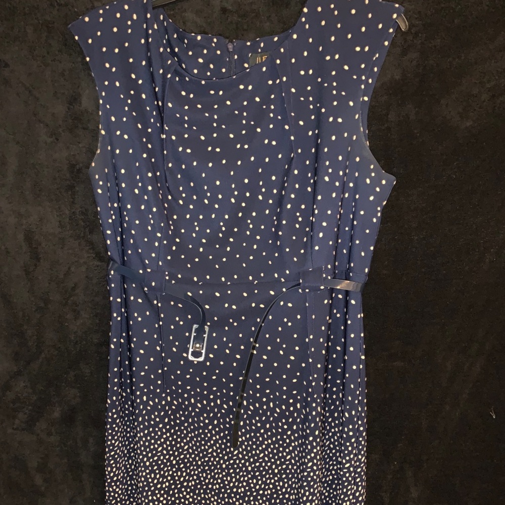 navy and cream knee length dress.